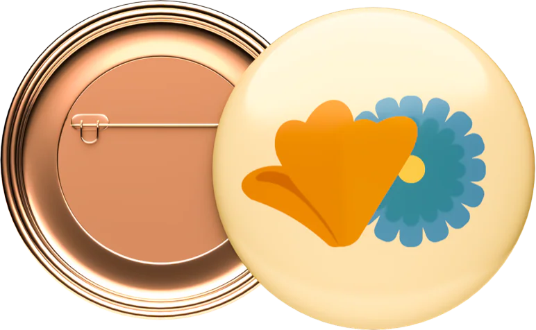 A copper badge pin and a cream one showing orange and blue flowers, for Canvas.