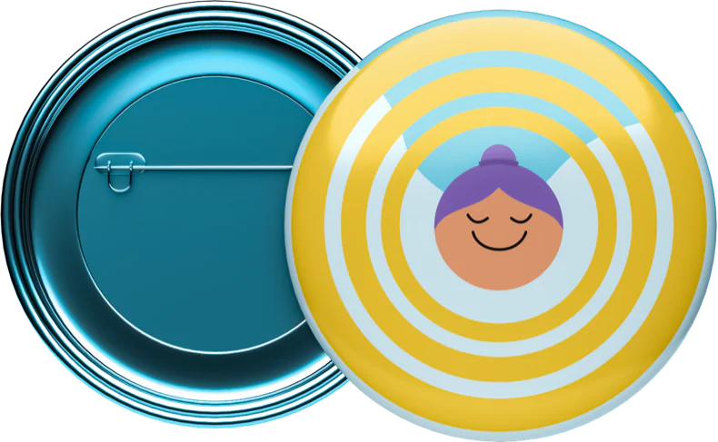 A teal badge pin and a yellow striped one showing a smiling face, for Flow.