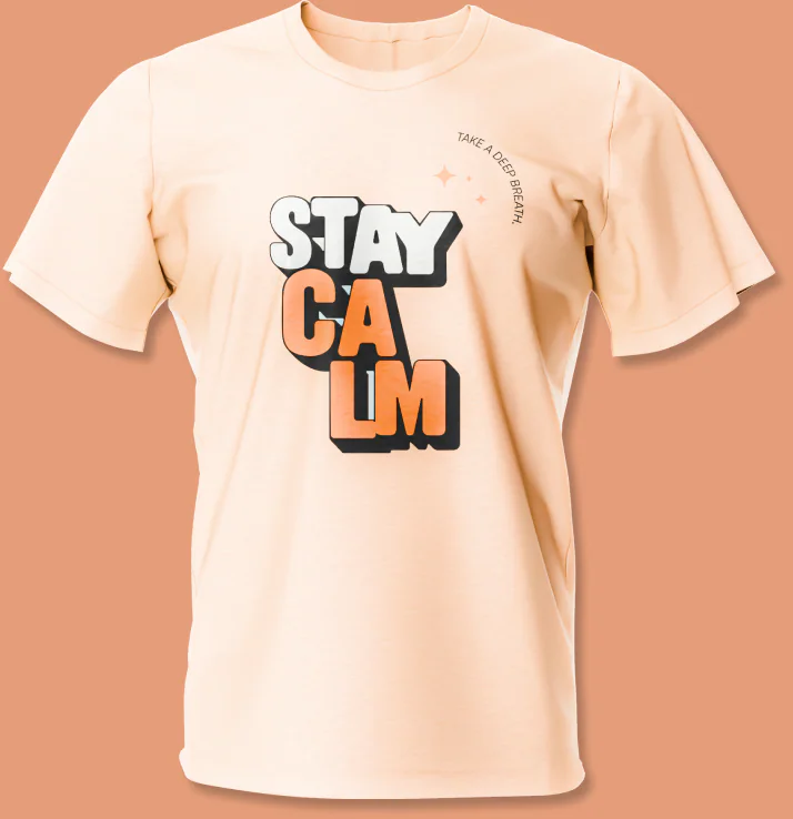 A peach T-shirt printed with the words Stay Calm, on an orange ground.