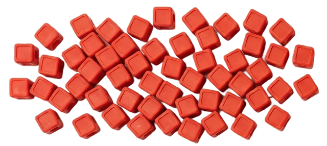 A pile of small red silicone connector cubes.