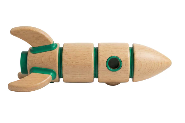 A wooden rocket lying on its side.